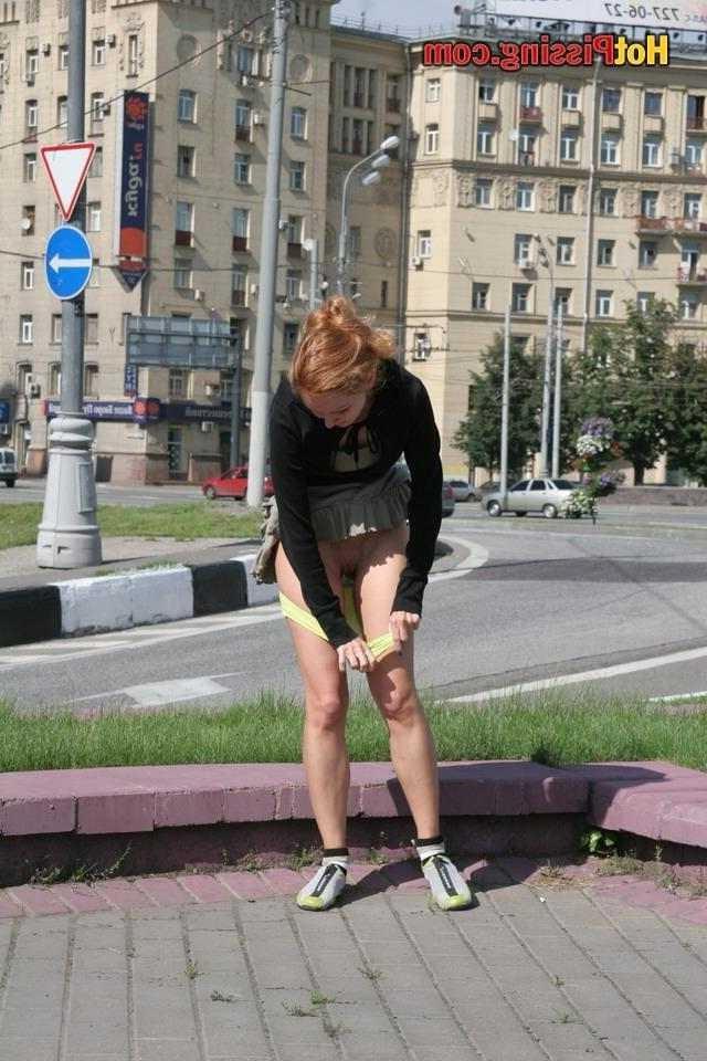 15P Slut pissing outdoors