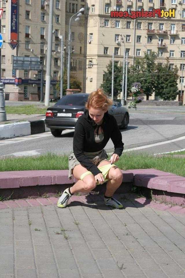 15P Slut pissing outdoors
