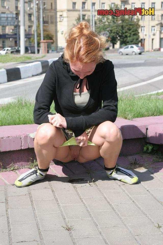 15P Slut pissing outdoors