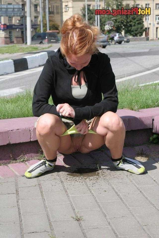 15P Slut pissing outdoors