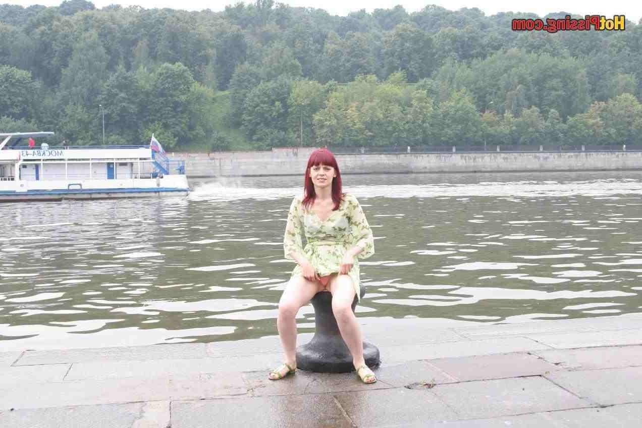 15P Slut pissing outdoors