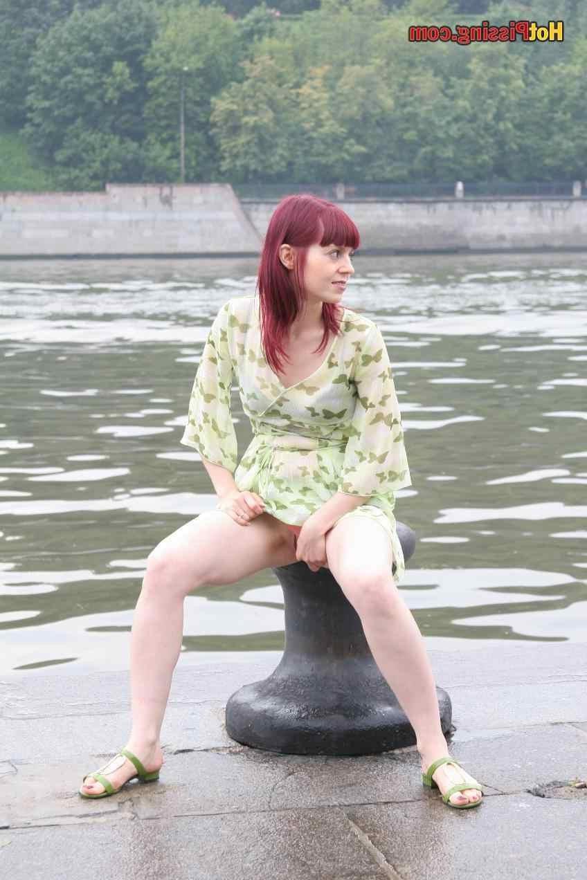 15P Slut pissing outdoors