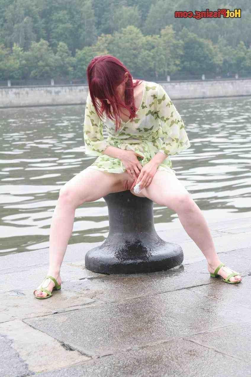 15P Slut pissing outdoors