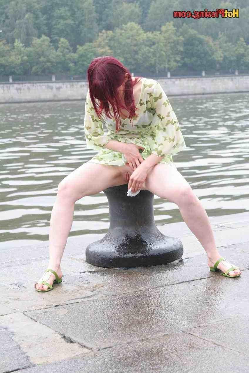 15P Slut pissing outdoors