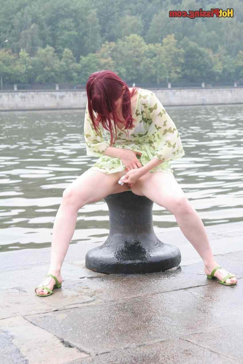 15P Slut pissing outdoors
