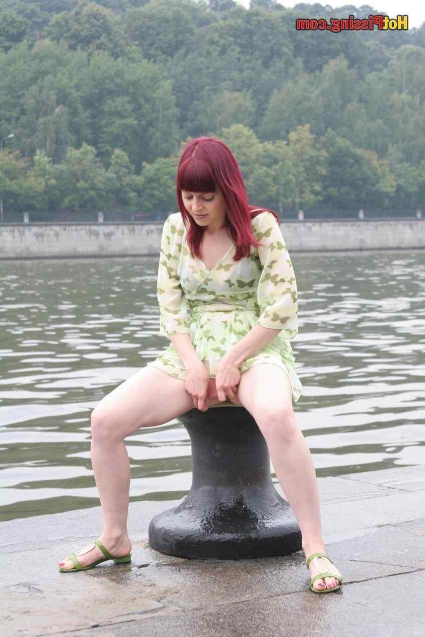 15P Slut pissing outdoors