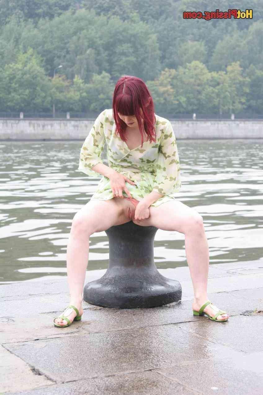 15P Slut pissing outdoors