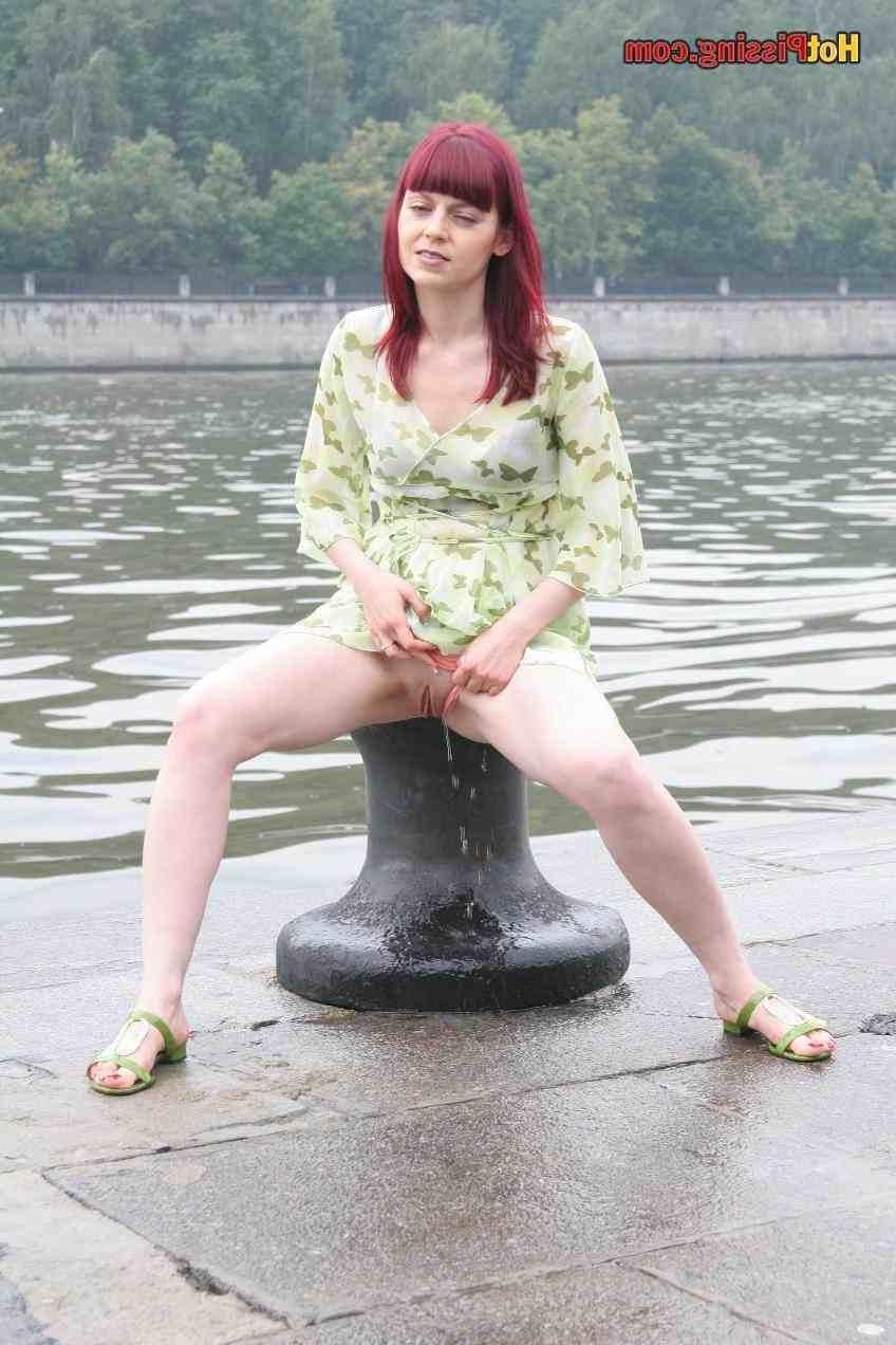 15P Slut pissing outdoors