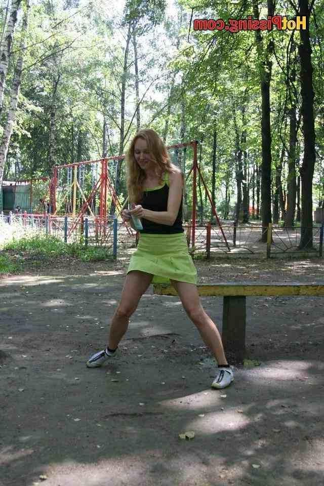 15P Slut pissing outdoors