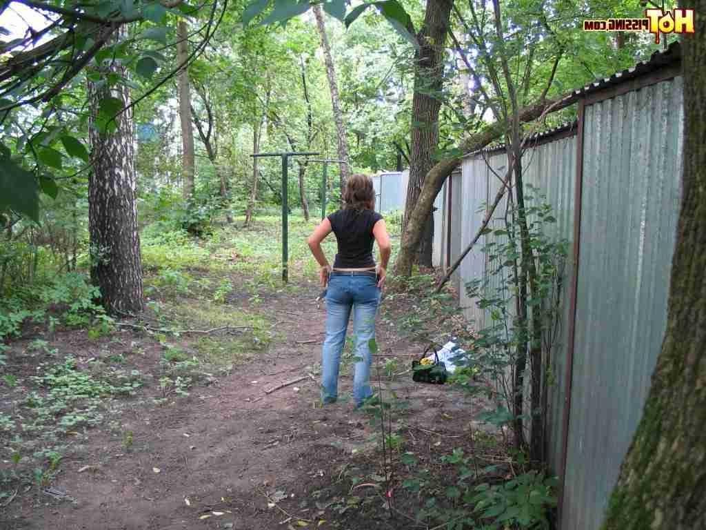 15P Slut pissing outdoors