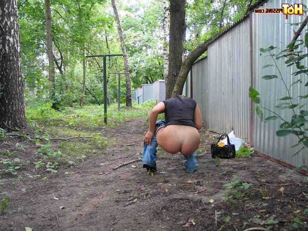 15P Slut pissing outdoors