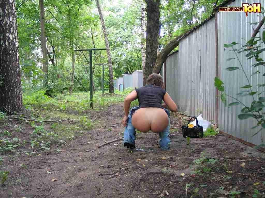 15P Slut pissing outdoors