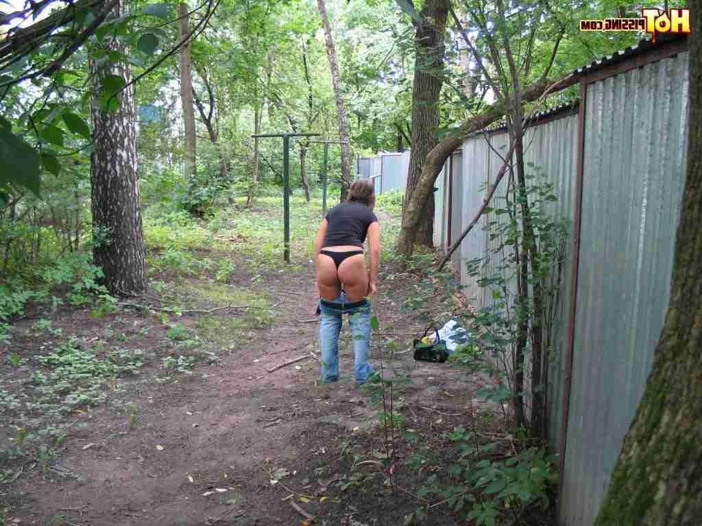15P Slut pissing outdoors