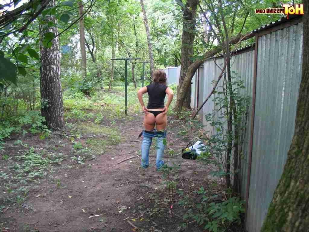 15P Slut pissing outdoors