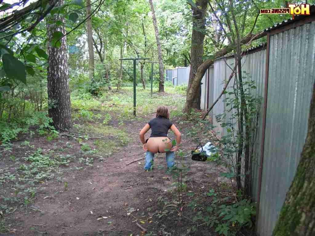 15P Slut pissing outdoors