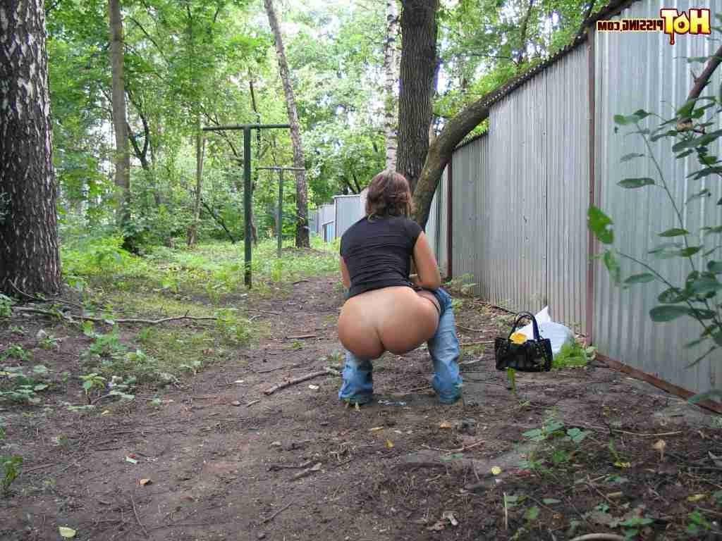 15P Slut pissing outdoors