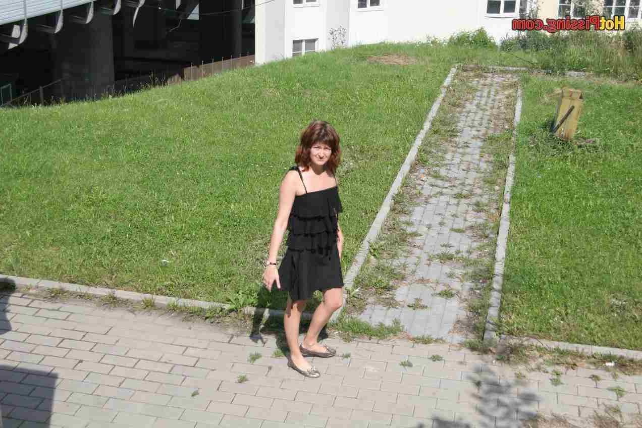 15P Slut pissing outdoors