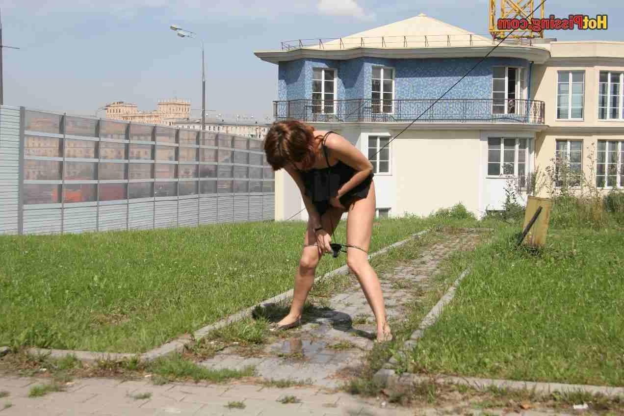 15P Slut pissing outdoors