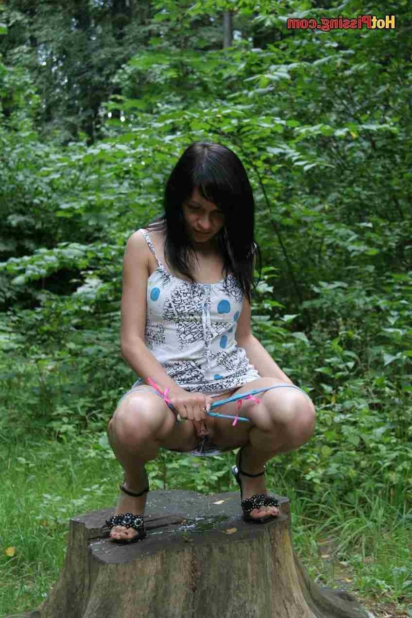 15P Sexy slut pissing outdoors