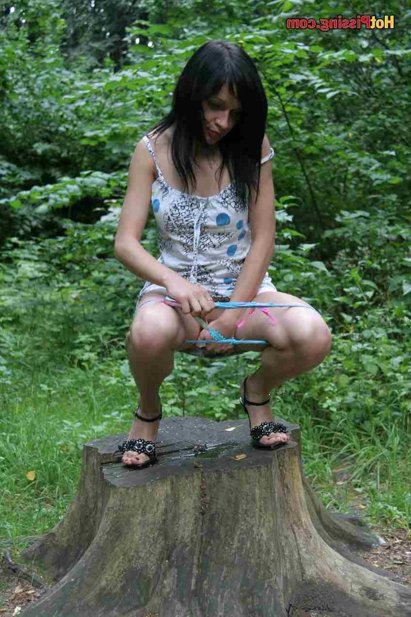 15P Sexy slut pissing outdoors