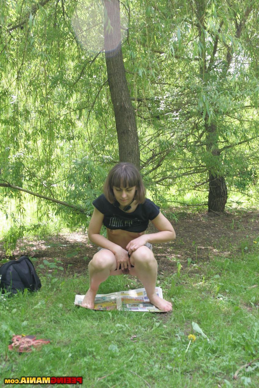 15P Bitchy miss pulls down her knicks and pees on a newspaper in the woods