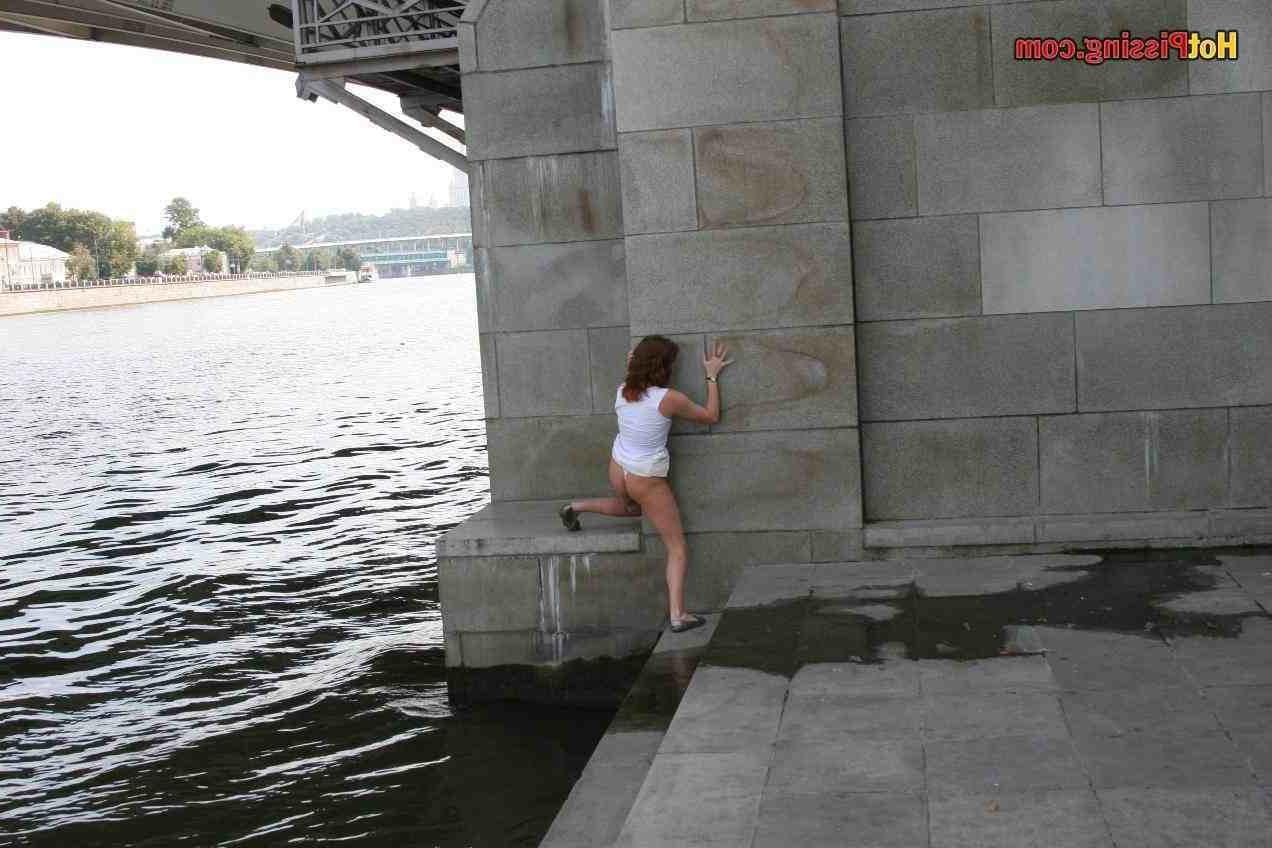 15P Slut pissing outdoors