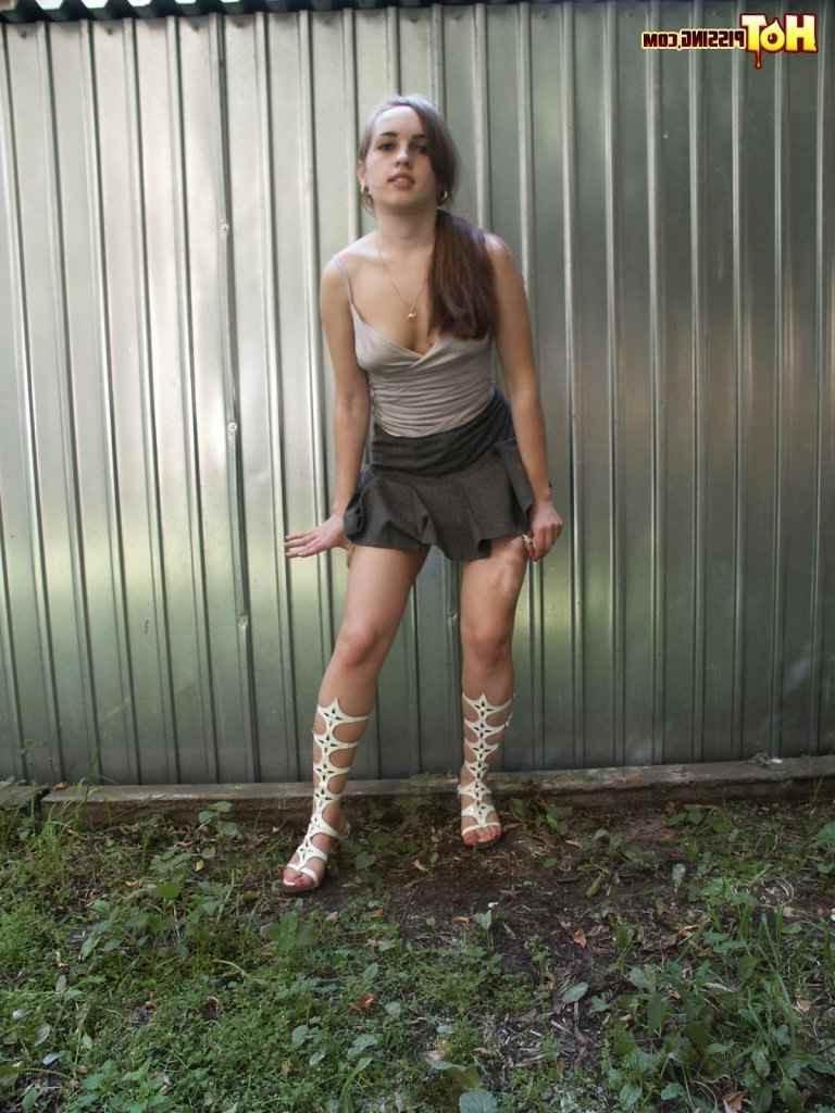 15P Cutie pissing outdoors