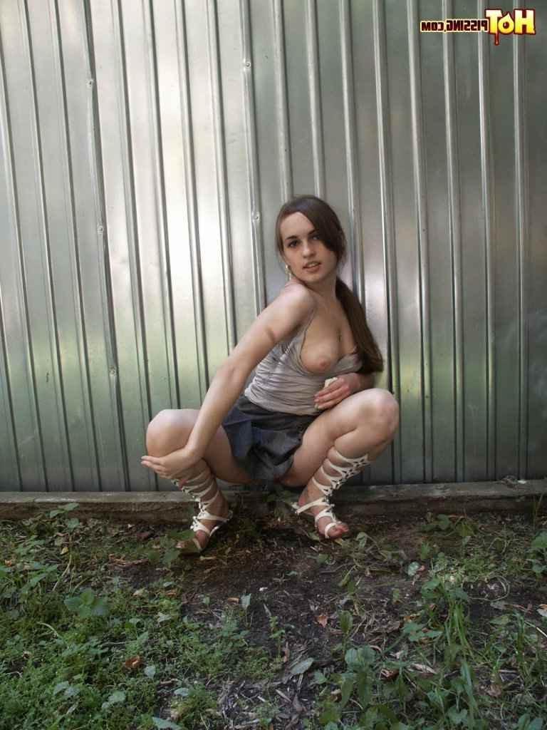 15P Cutie pissing outdoors
