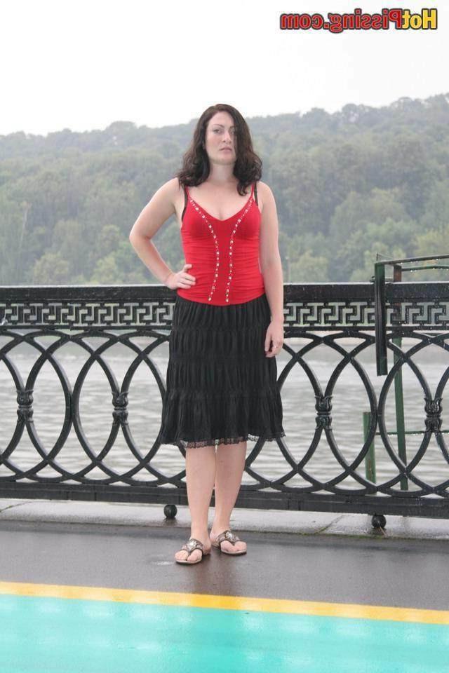 15P Slut pissing outdoors