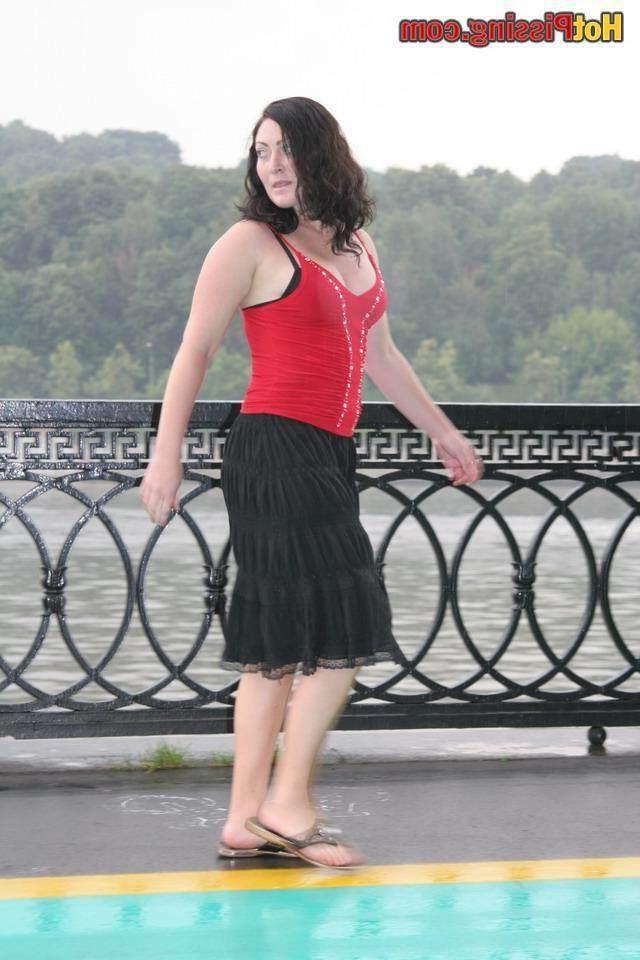 15P Slut pissing outdoors