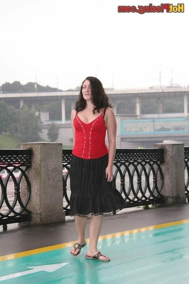 15P Slut pissing outdoors