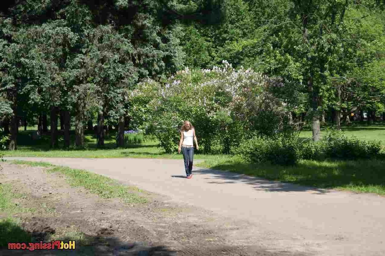 15P Slut pissing outdoors