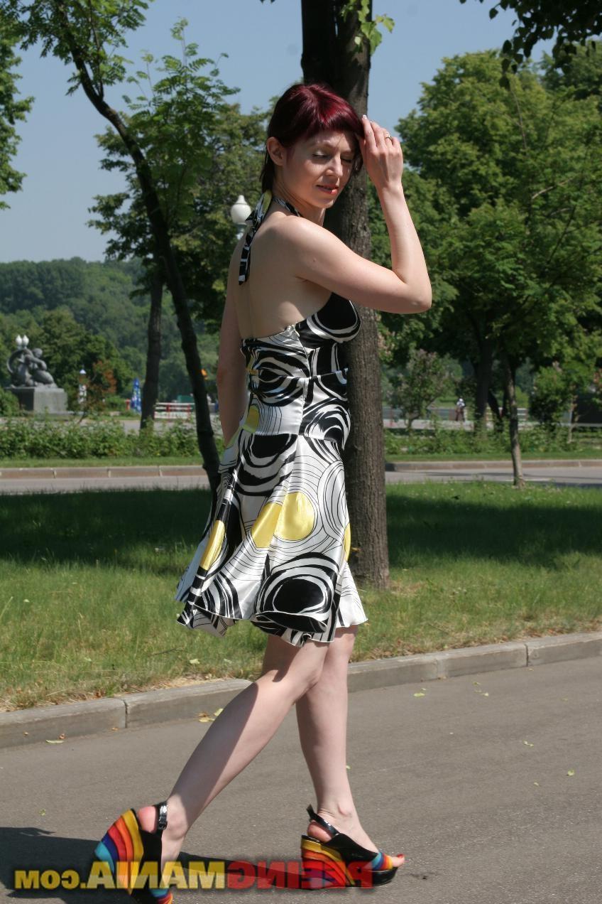 15P A huge piss puddle done by a redhead minx in a summer dress outdoors
