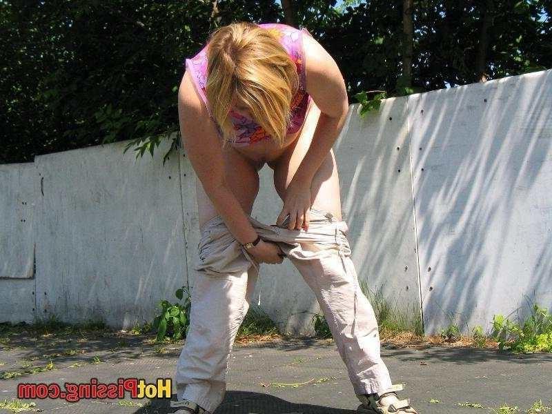 15P Slut pissing outdoors