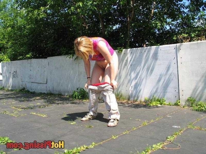 15P Slut pissing outdoors