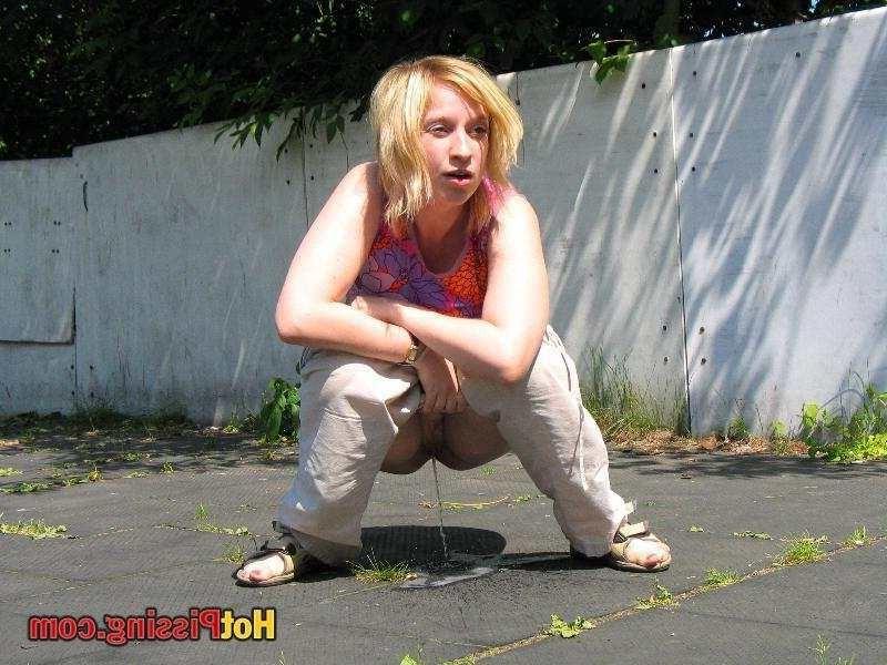 15P Slut pissing outdoors