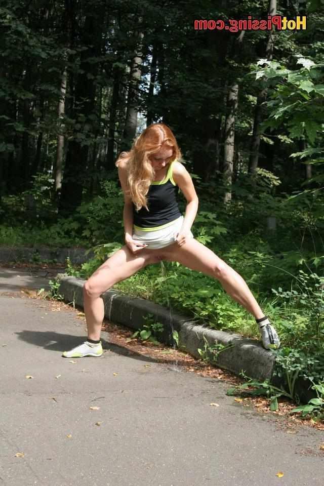 15P Slut pissing in the street