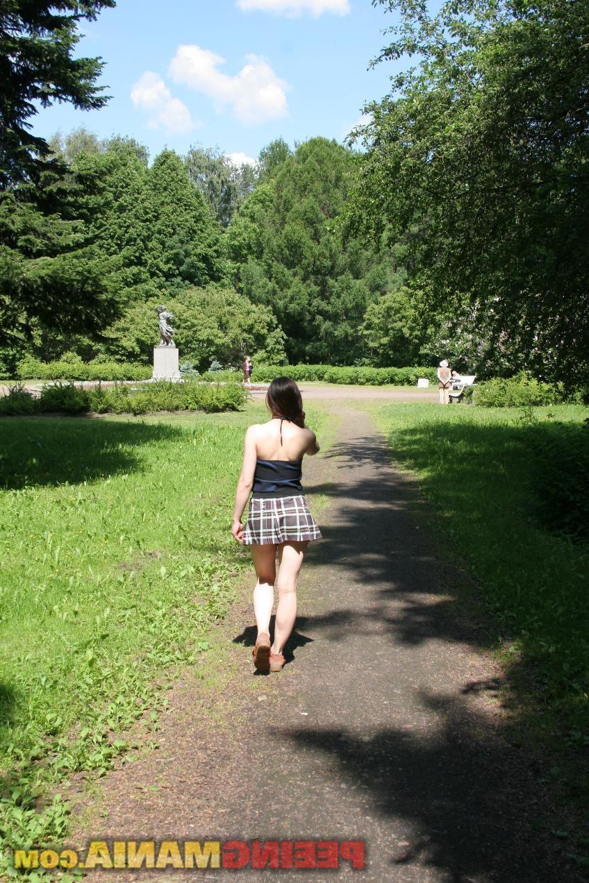 15P Glassed cutie wets her azure sexy knickers and the bench in the park