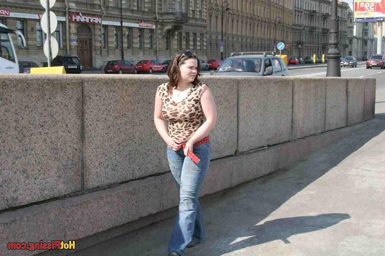 15P Slut pissing outdoors