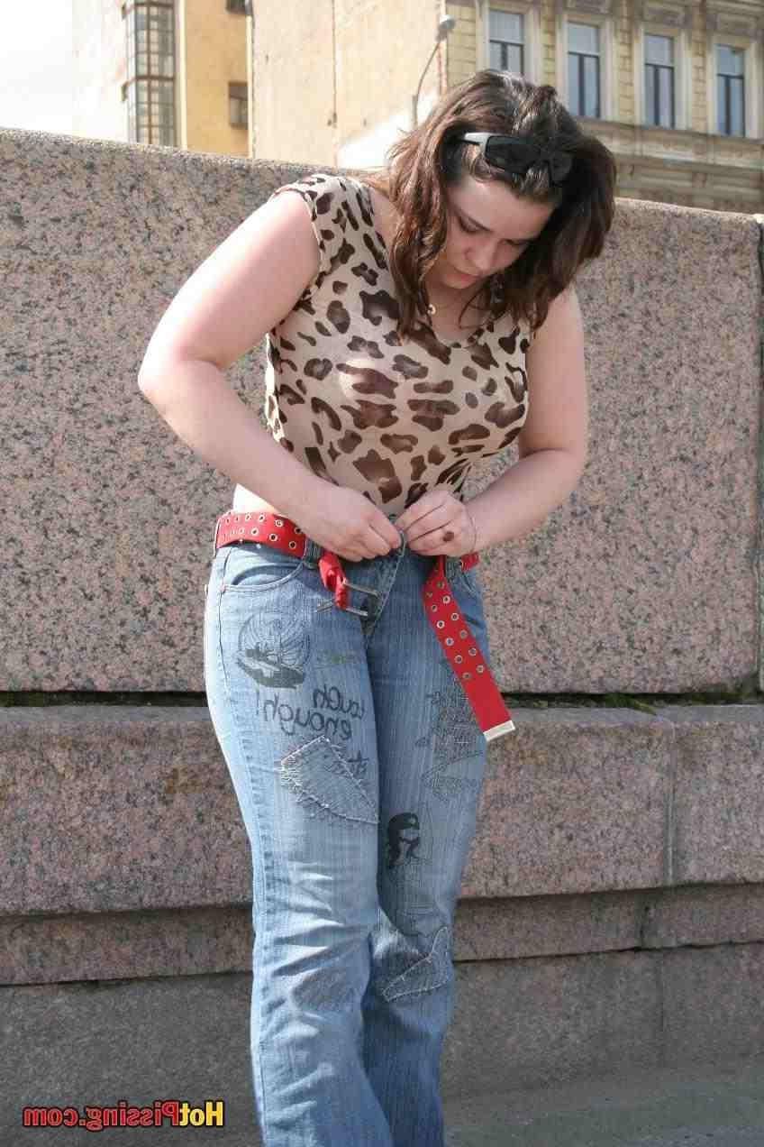 15P Slut pissing outdoors
