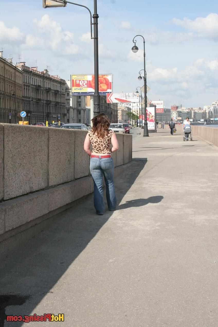15P Slut pissing outdoors