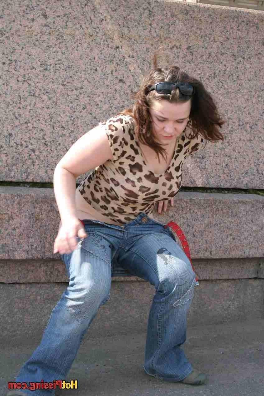 15P Slut pissing outdoors