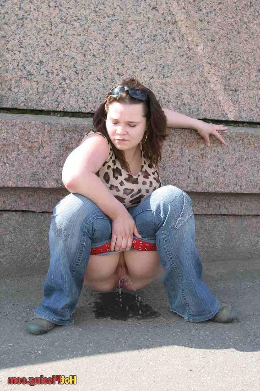 15P Slut pissing outdoors