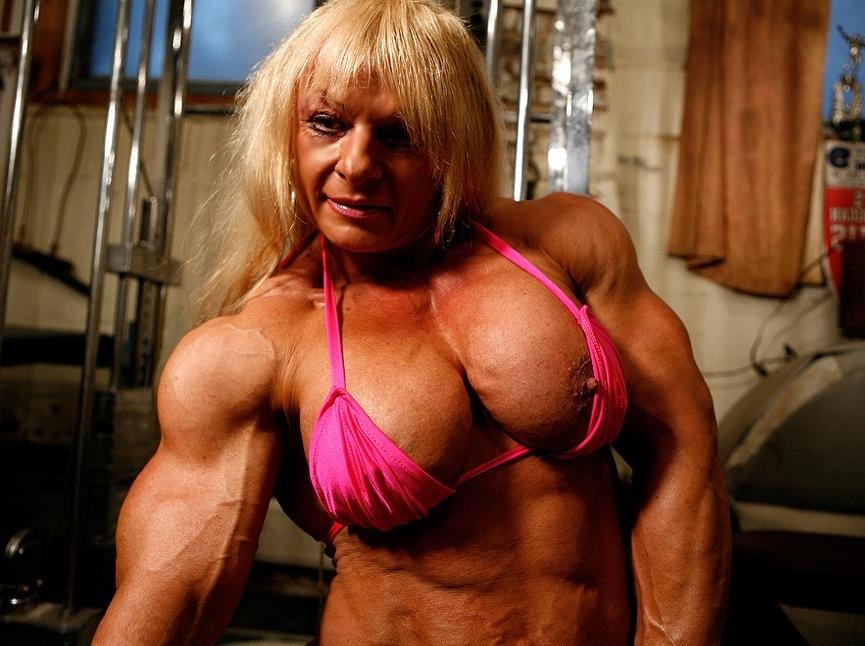 12P Truly massive and ultra ripped female muscle beast posing sexy