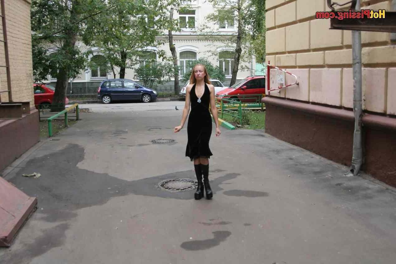 15P Slut pissing outdoors