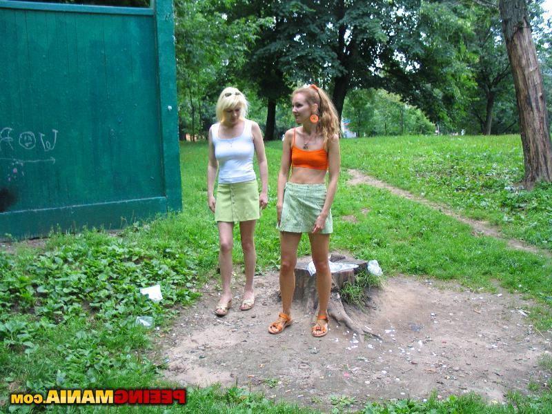 15P Two bitchy angels do a wee-wee synchronically and wipe their cunnies