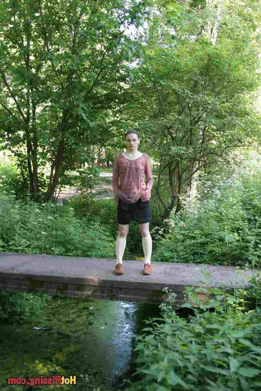 15P Slut pissing off a bridge