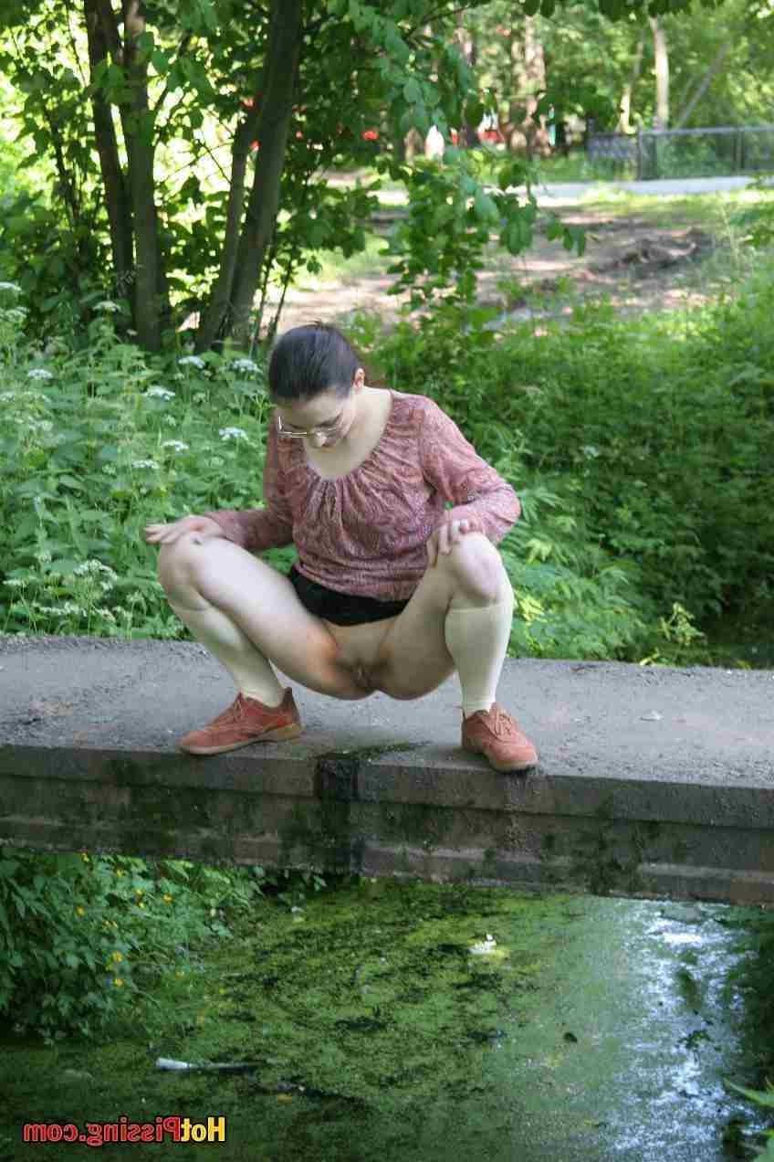15P Slut pissing off a bridge