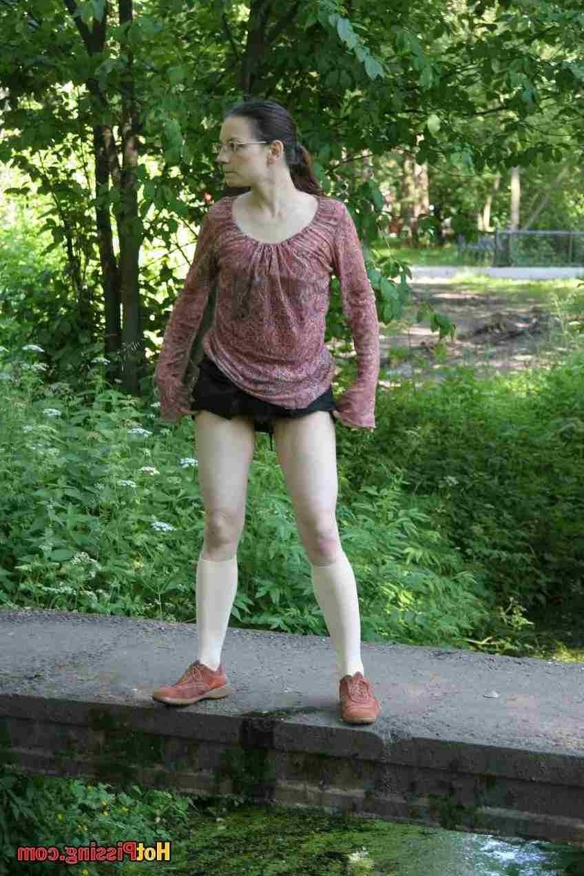 15P Slut pissing off a bridge