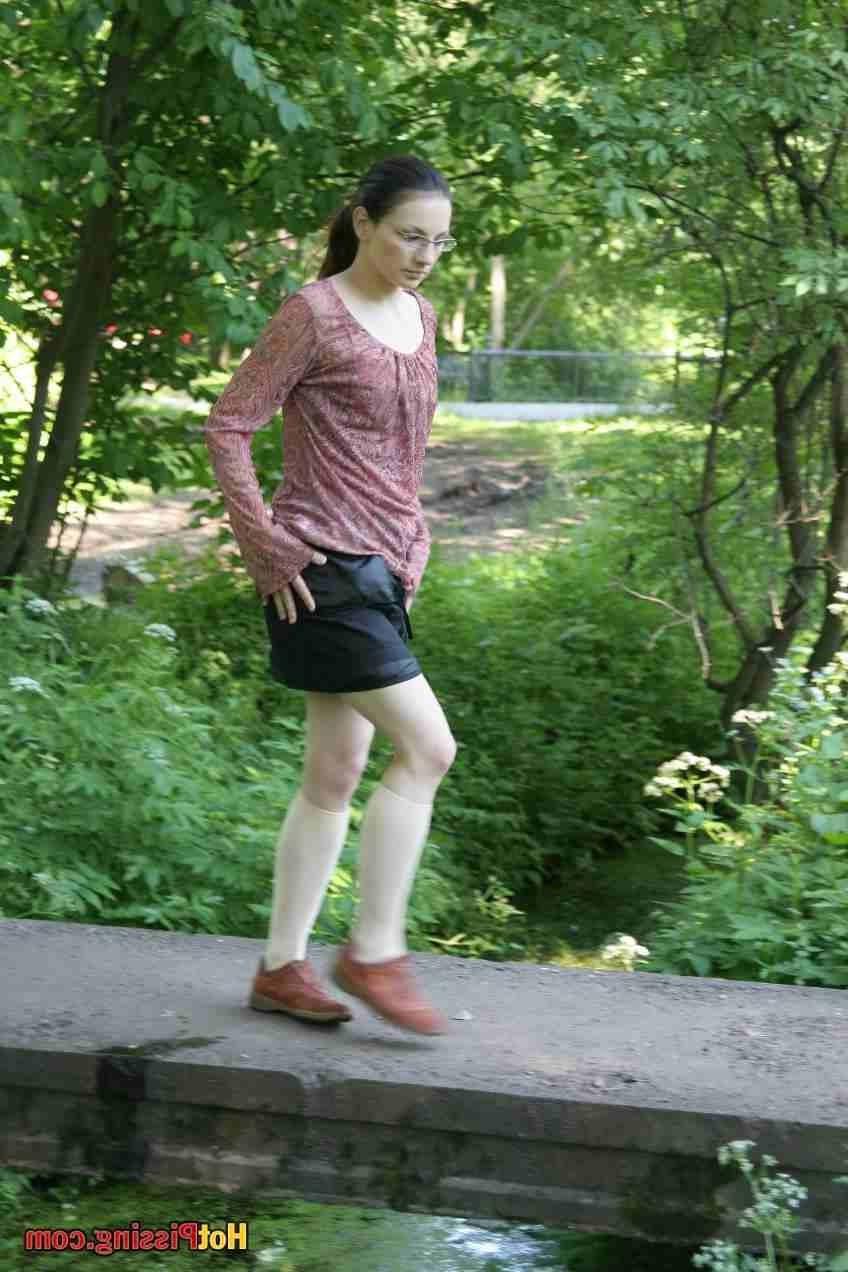 15P Slut pissing off a bridge